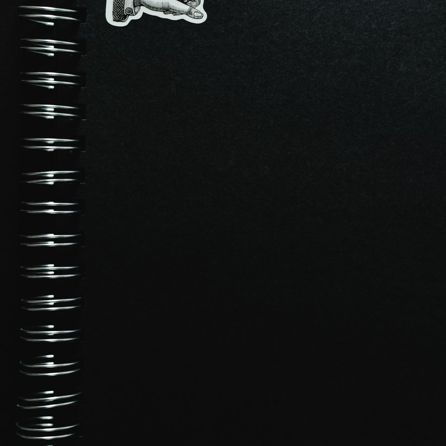 Black spiral notebook